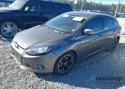 2012 Ford Focus Titanium z USA, uszkodzony, nr VIN 1FAHP3N25CL225033